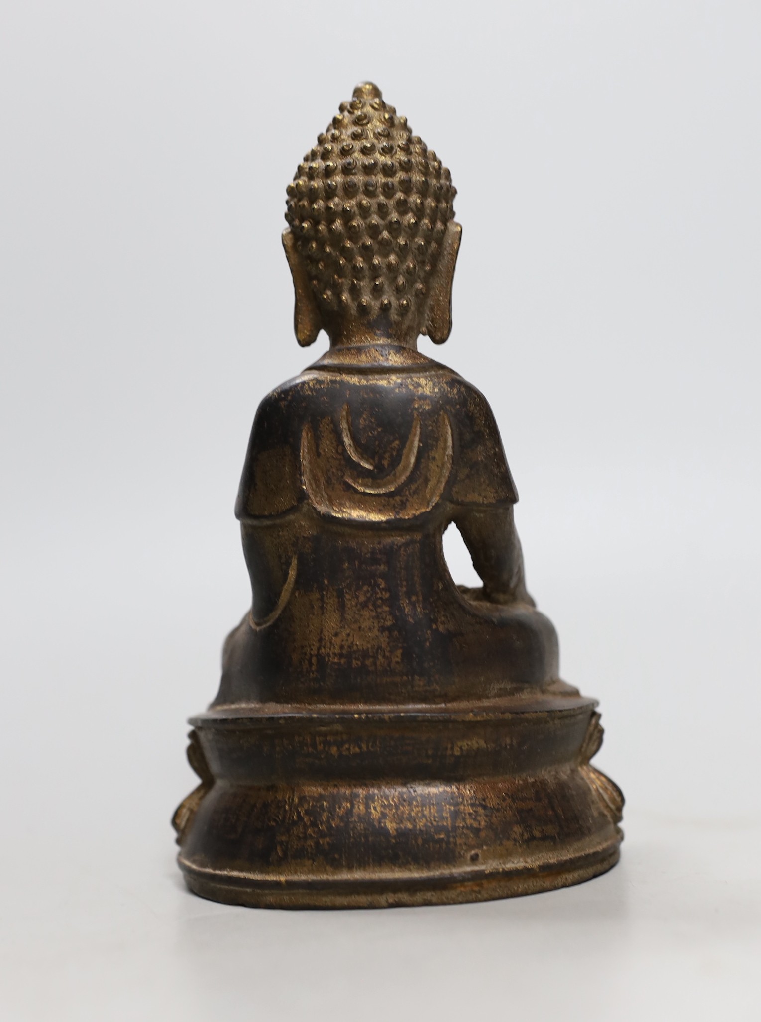 A Chinese gilt iron seated figure of Buddha, 19cm - Image 3 of 4