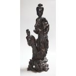 A Chinese root wood carving of two women, 42cm