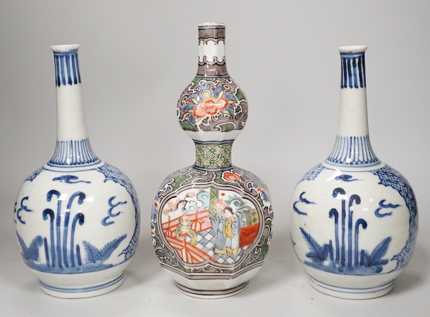 A Chinese famille verte octagonal double gourd vase, together with a pair of Chinese blue and