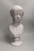 A Continental tin glazed terracotta bust of a boy, 47cm tall