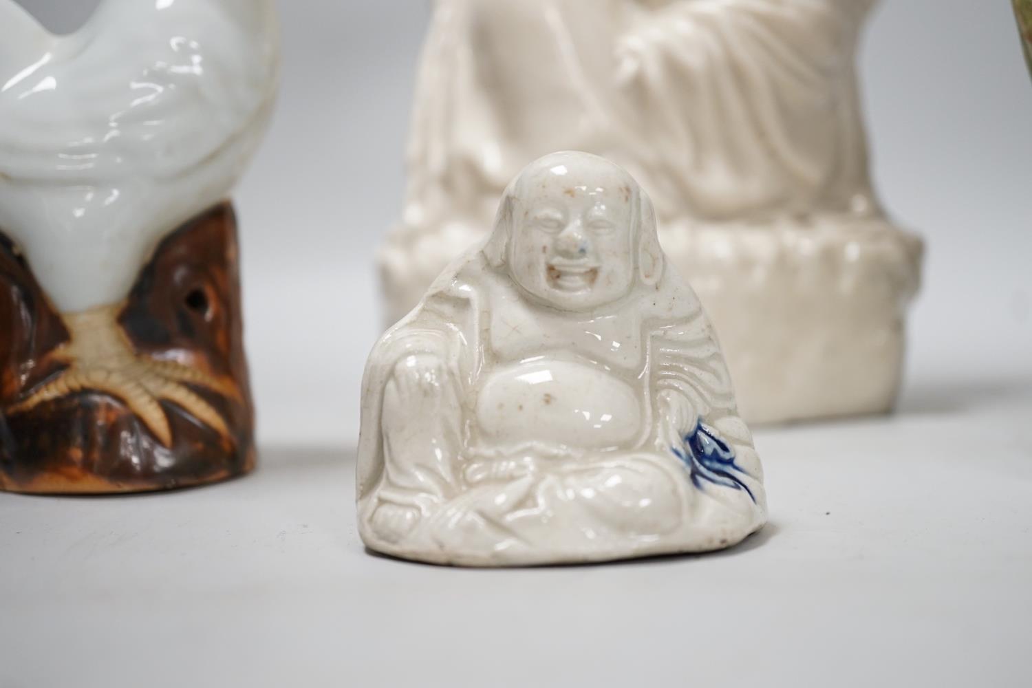 A Chinese enamelled blanc de chine figure of Guanyin, together with three other figures. 28cm tall - Image 2 of 11