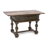 A late 17th century Dutch oak side table, with rectangular top and frieze drawer, on baluster legs