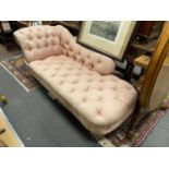 A small Victorian chaise longue with buttoned pink upholstery, length 180cm, depth 68cm, height