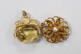 A George V 9ct gold mounted citrine spinning fob pendant, 26mm and a 9ct, citrine and cultured pearl