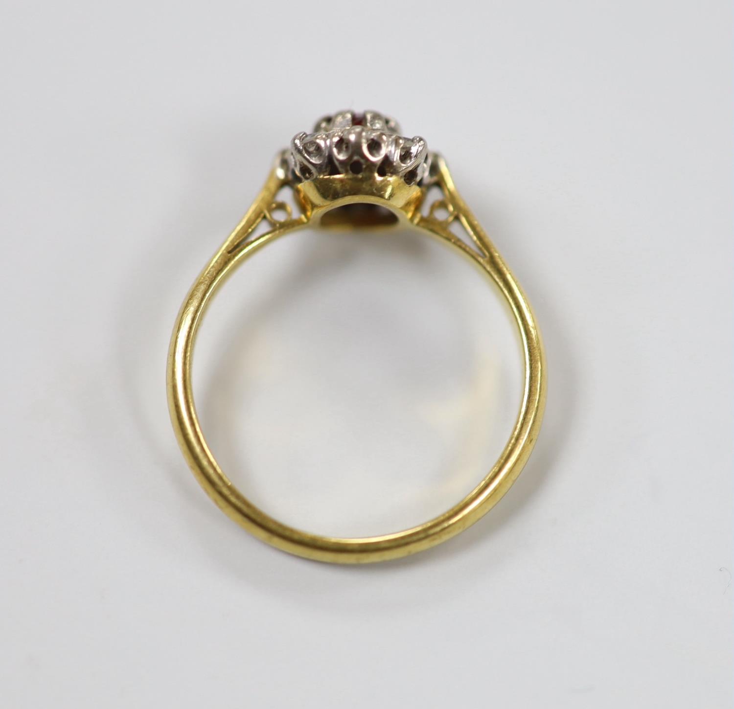 A modern 18ct gold, garnet? and diamond set oval cluster ring, size M, gross weight 3.2 grams. - Image 4 of 4