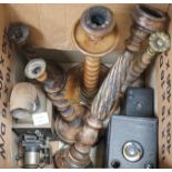 A group of five various wooden candlesticks, two vintage Kodak box cameras and magic lantern slide