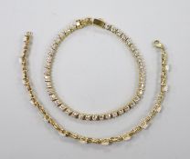 A modern 14k yellow metal and simulated diamond set line bracelet, 18cm and a 14k yellow metal and