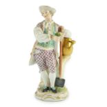 A Meissen figure of a gardener, c.1770, modelled by Michel Victor Acier, holding a posy of flowers