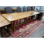 A large 18th century style rectangular oak refectory dining table, length 296cm, depth 89cm,