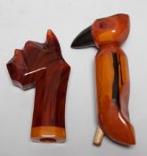 Two butterscotch amber phenolic Bakelite umbrella handles