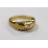 An 18ct gold and gypsy set solitaire diamond ring, size O/P, gross weight 3.9 grams.