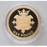 A 2014 Jersey 22ct gold Proof £1 coin, with box and certificate.