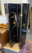 A Chinese lacquer four fold dressing screen, each panel width 40cm, height 184cm