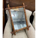 A late Victorian faux bamboo rectangular frame wall mirror, width 56cm, height 74cm