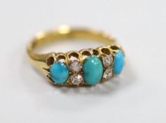 A late Victorian 18ct gold, three stone turquoise and four stone diamond set half hoop ring, size L,