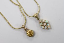 A modern 585 and white opal cluster set diamond shaped pendant, 17mm, on a 14k chain43cm and a