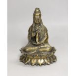 A Chinese bronze seated figure of Guanyin, 13cm