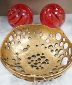 A pair of globular coloured glass ornaments and an art-bronze bowl, 33cm diameter