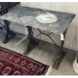 A rectangular cast iron marble topped garden table, length 92cm, depth 54cm, height 69cm