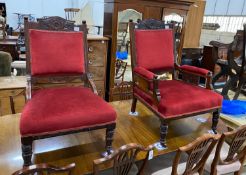 A pair of late Victorian carved mahogany upholstered salon chairs, one with arms, width 70cm,