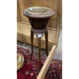 An Edwardian inlaid mahogany jardiniere with brass liner, height 93cm