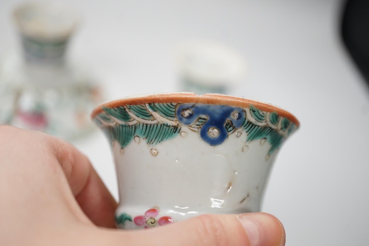 Three 19th century Chinese famille rose pedestal stem bowls, each painted with flowers and - Image 6 of 6