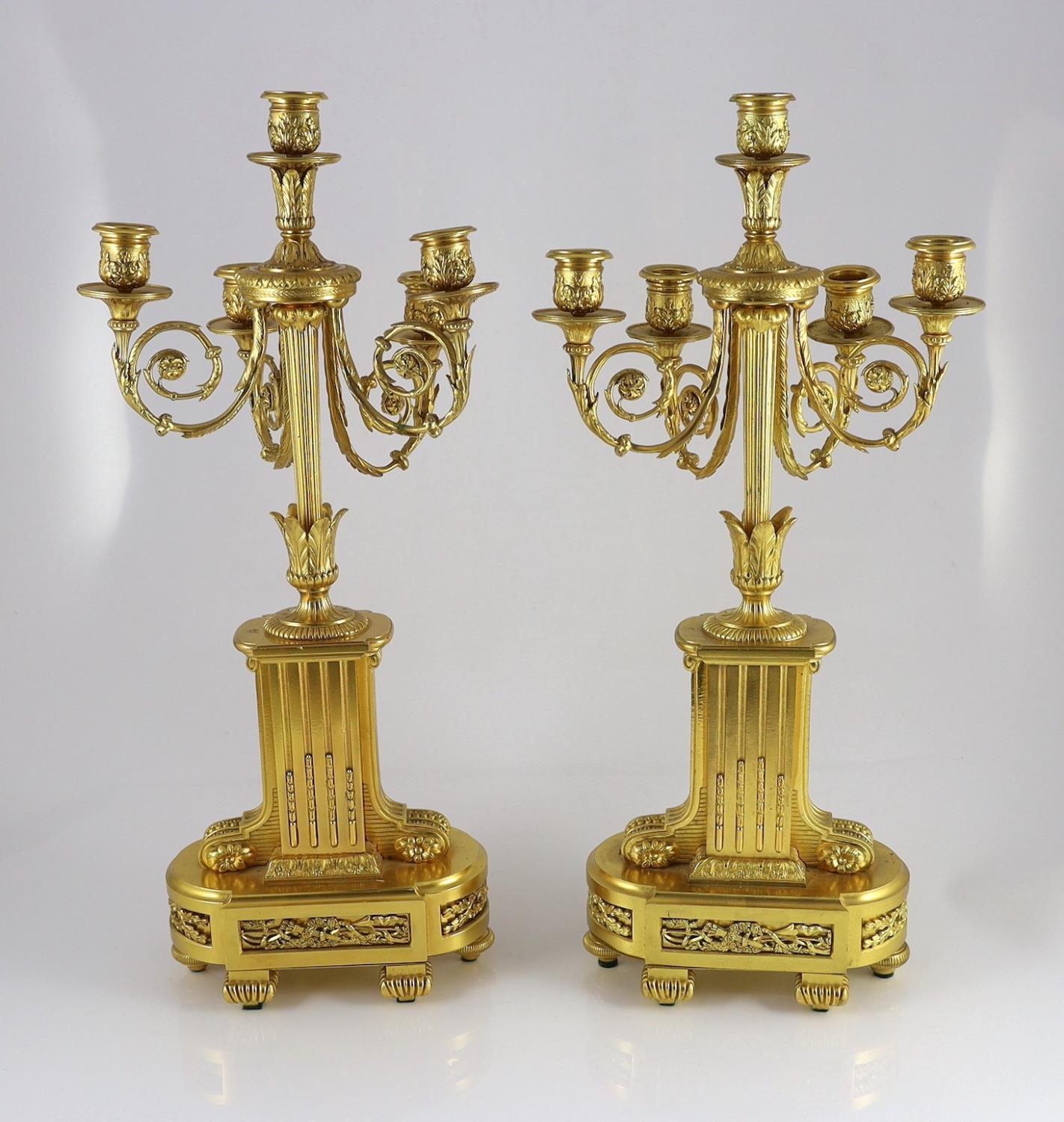 A pair of 19th century French ormolu five light candelabra, with foliate scroll branches and stepped - Image 6 of 6
