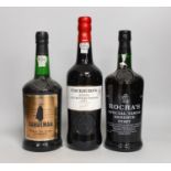 Three bottles of port including Rochas, Cockburns and Sandemans