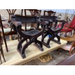 A pair of 19th century Spanish embossed leather and carved walnut framed 'X' framed armchairs, width