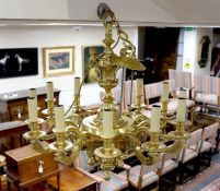 A 20th century brass and ormolu chandelier, after a design by Daniel Marot