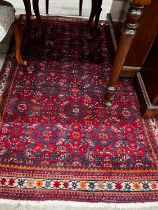A North West Persian red ground rug, 164 x 105cm