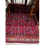 A North West Persian red ground rug, 164 x 105cm