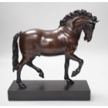 A reproduction bronzed figure of a horse, together with a column desk lamp, 53cm tall excl. light