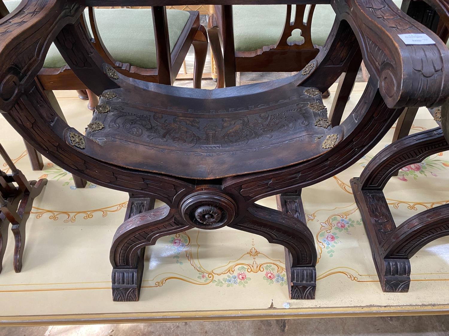 A pair of 19th century Spanish embossed leather and carved walnut framed 'X' framed armchairs, width - Image 3 of 3