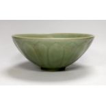 A Chinese celadon ground ‘lotus’ bowl, 21cm diameter