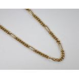 A modern 9ct gold curb and elongated link chain, 66cm, 24.7 grams.