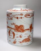 An early 20th century copper red enamelled canister. 30cm tall