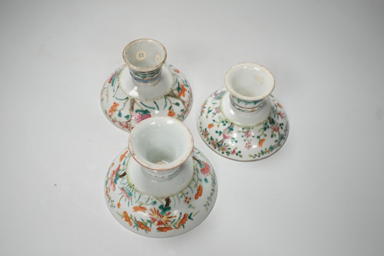 Three 19th century Chinese famille rose pedestal stem bowls, each painted with flowers and - Image 5 of 6