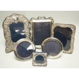 Six assorted modern silver mounted photograph frames, largest 21cm.