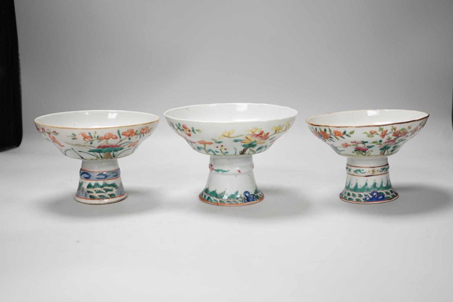 Three 19th century Chinese famille rose pedestal stem bowls, each painted with flowers and - Image 2 of 6