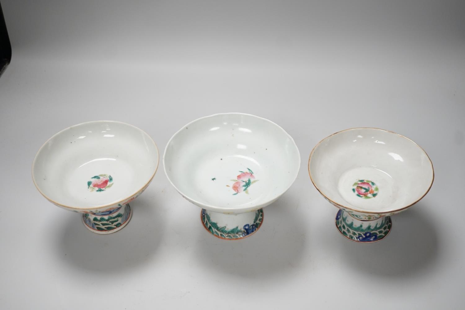 Three 19th century Chinese famille rose pedestal stem bowls, each painted with flowers and - Image 3 of 6