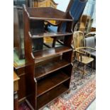 A 19th century mahogany graduated open bookcase, length 82cm, depth 31cm, height 152cm