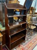 A 19th century mahogany graduated open bookcase, length 82cm, depth 31cm, height 152cm