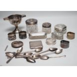 Sundry silver items, including a 1930's silver presentation cup, height 10.9cm, five silver or white