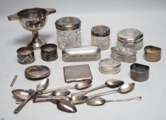 Sundry silver items, including a 1930's silver presentation cup, height 10.9cm, five silver or white