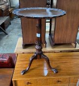 A George III style circular mahogany wine table, diameter 45cm, height 63cm