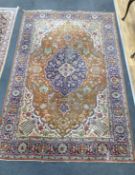 A Tabriz ivory ground carpet 360cm x 220cm