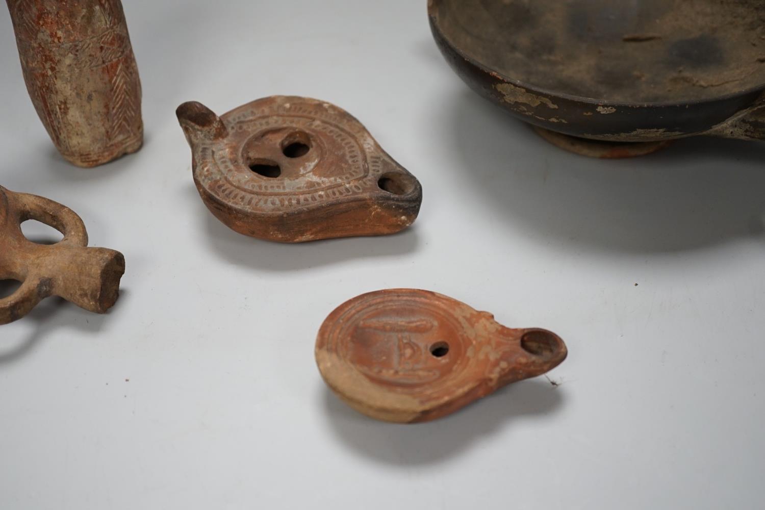 An Apulian black painted kylix, c. 4th century BCE., a Cypriot pottery flask, early Iron Age, two - Image 6 of 8