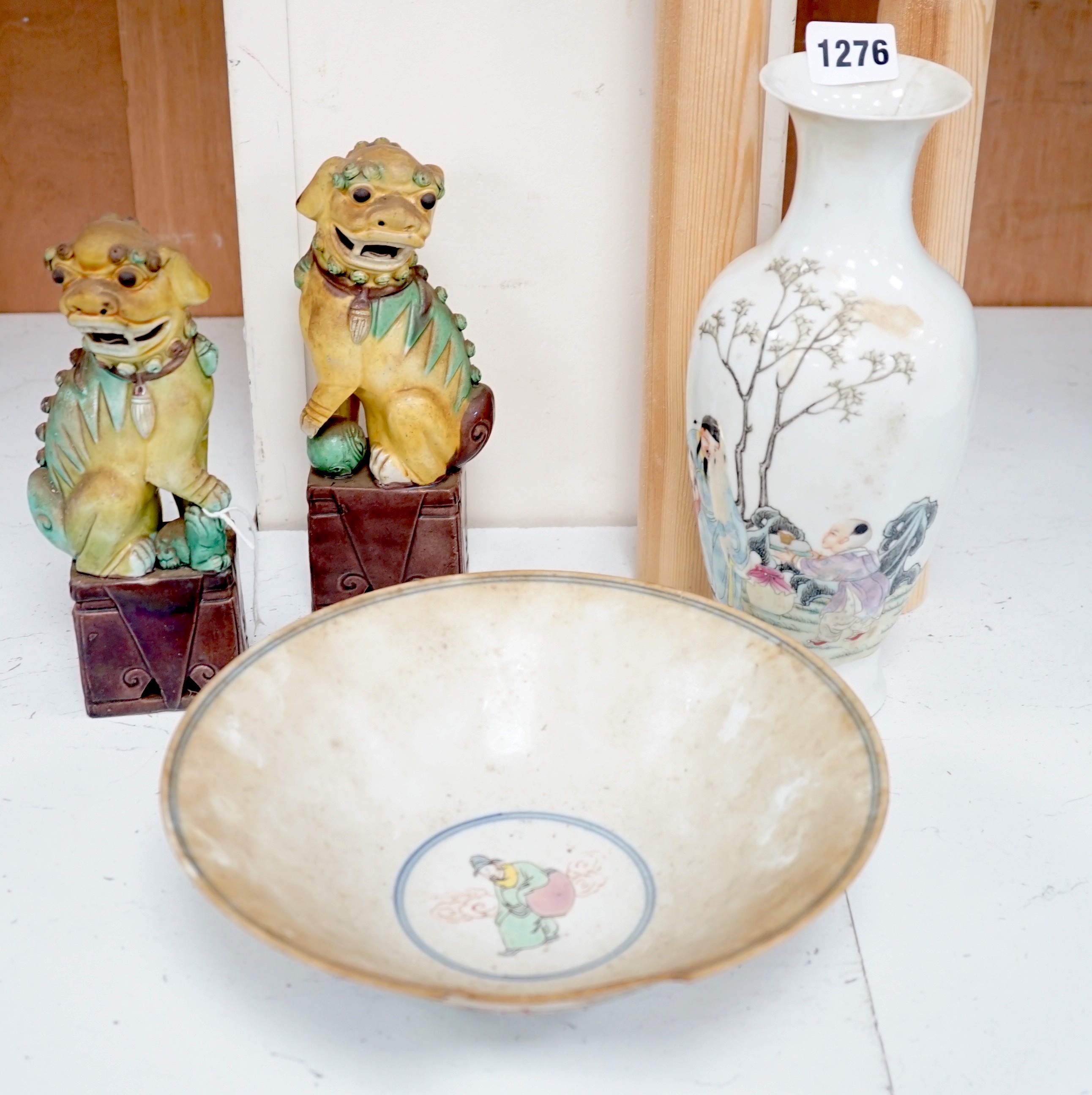 A pair of Chinese sancai lion dogs, together with a Chinese Republic period famille rose vase and