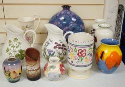 A collection of Poole pottery jugs and vases. Tallest 29cm